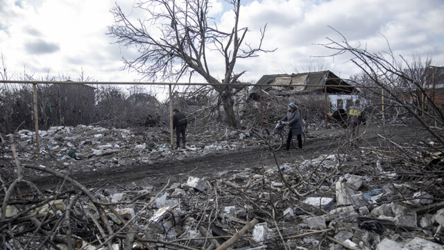 OCHERETYNE, DONETSK OBLAST, UKRAINE, FEBRUARY 21: Civilians walk by destruction on a civilian district after a missile attack in Pokrovsk City in Donbas, Ukraine, February 21th, 2024.